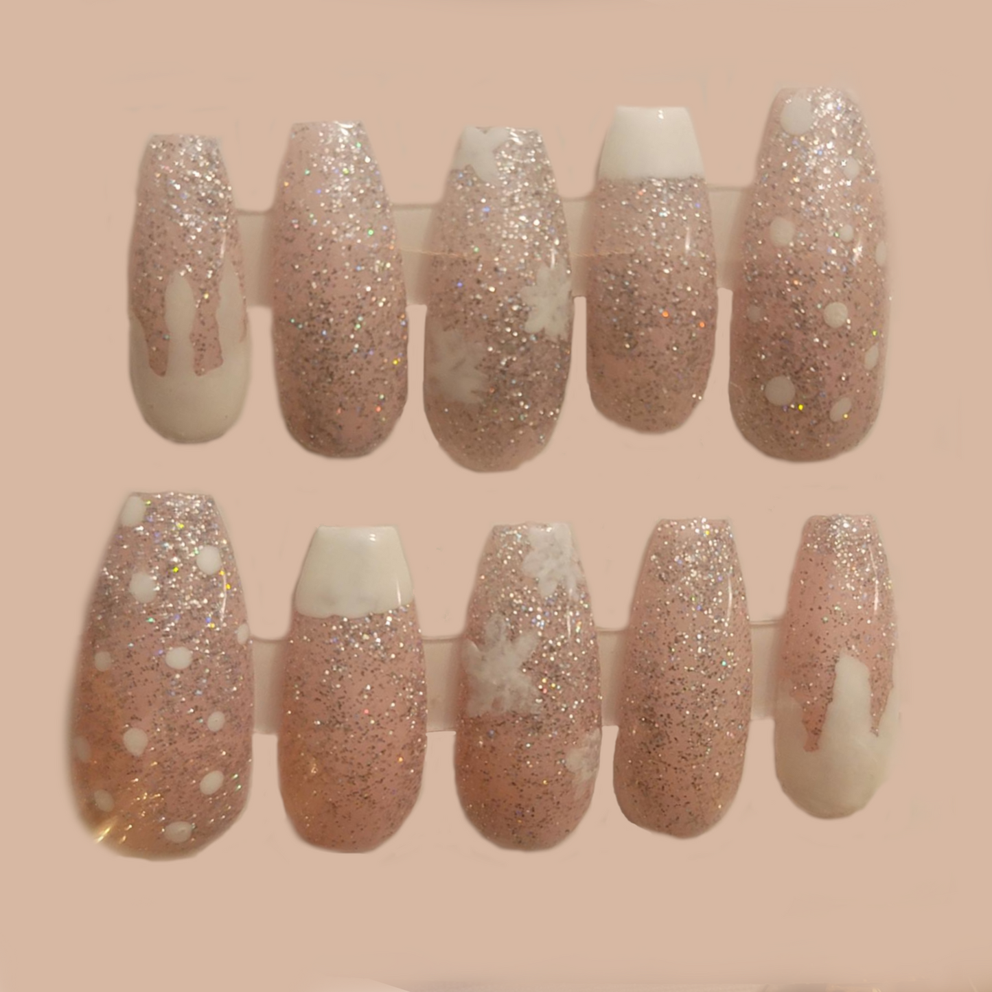 Pink Translucent Nails With Glitter And Winter Decorations